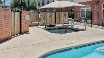 Outdoor pool, open 6:00 AM to 10:00 PM, sun loungers