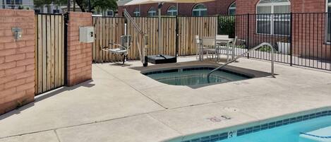 Outdoor pool, open 6:00 AM to 10:00 PM, sun loungers