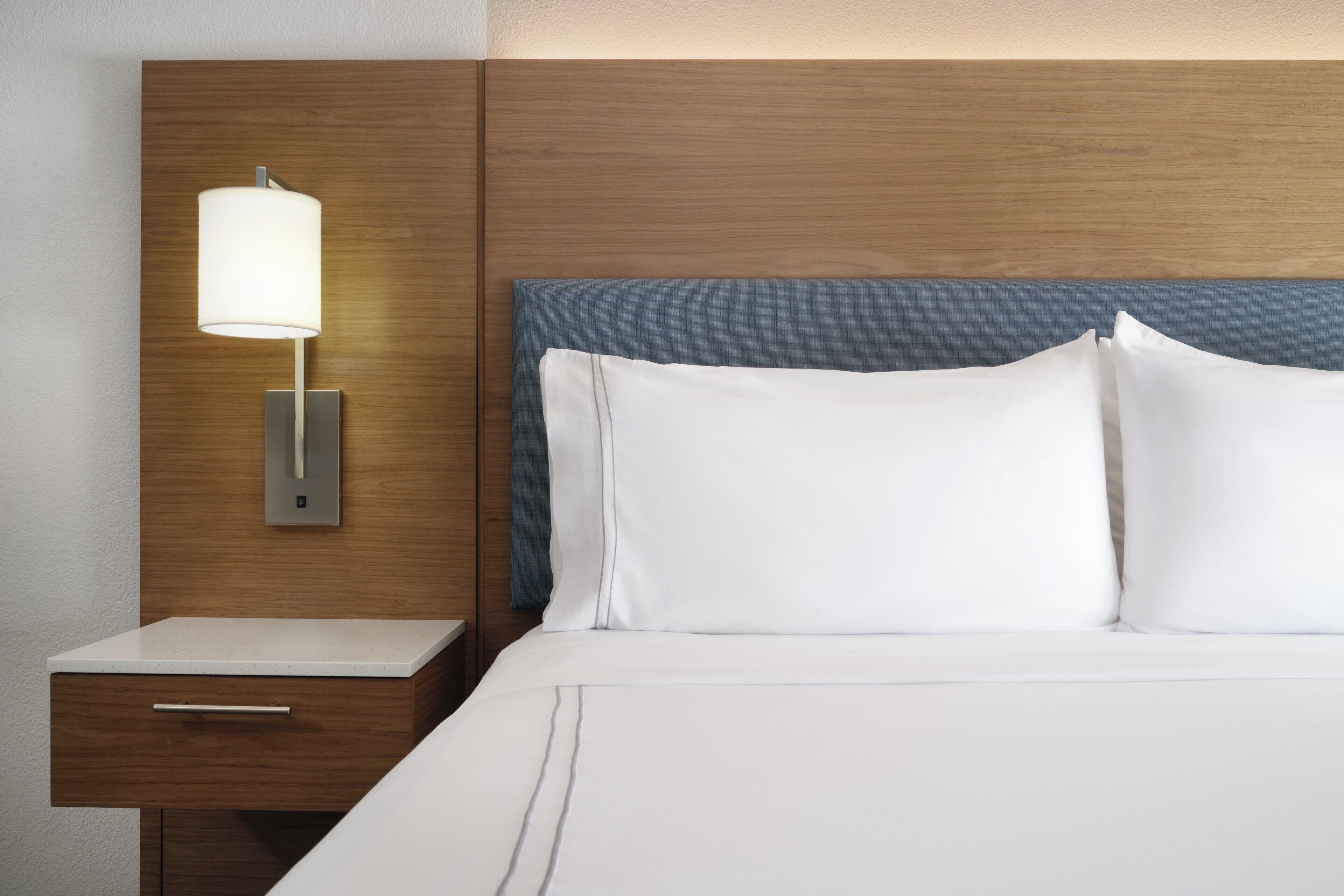 Premium bedding, down comforters, pillowtop beds, in-room safe