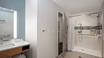 Suite, 1 Queen Bed, Accessible (Communications, Accessible Tub) | Bathroom | Designer toiletries, hair dryer, towels