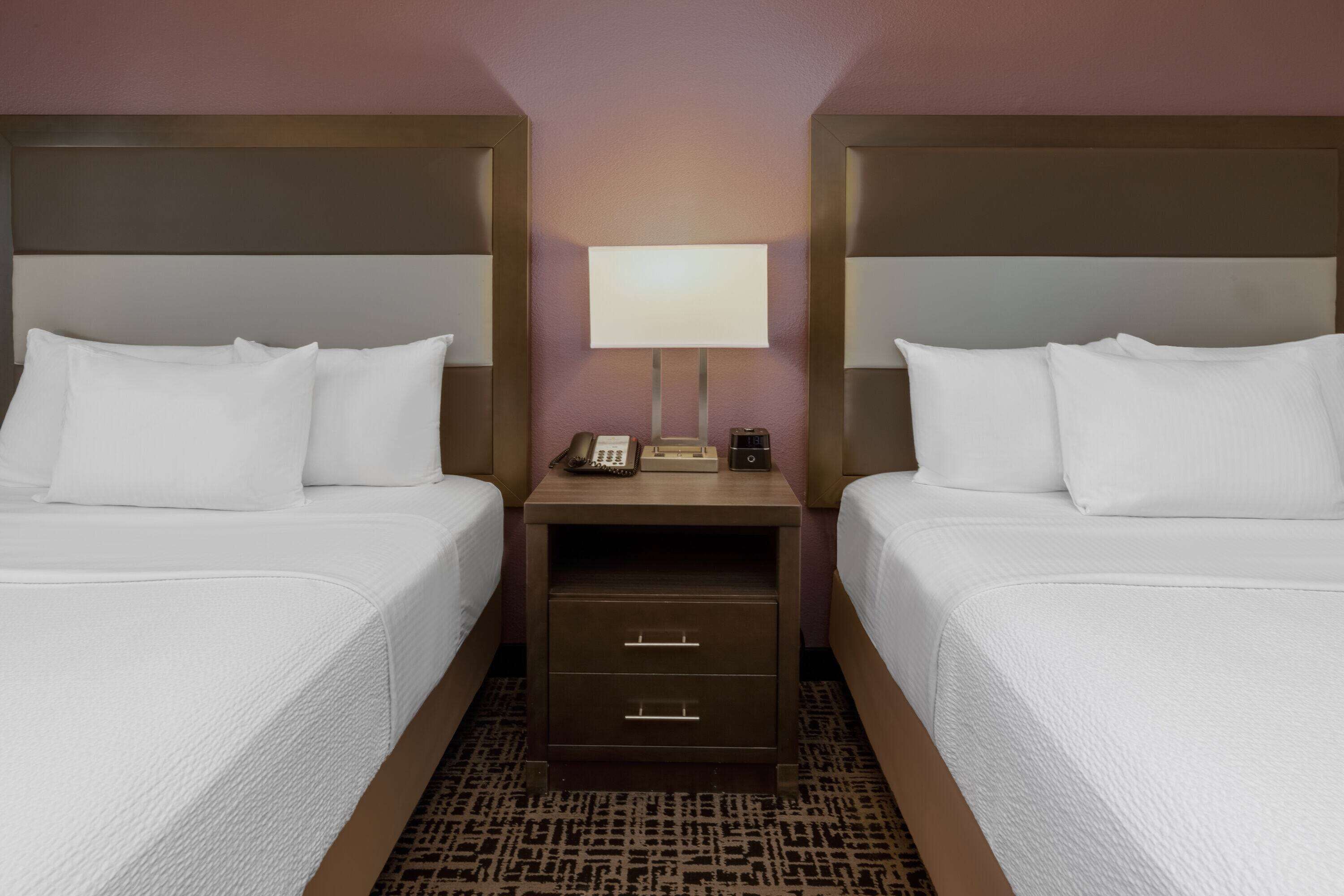 room, 2 queen beds | premium bedding, desk, laptop workspace, iron/ironing board