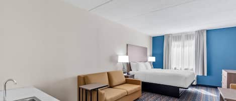 Suite, 1 King Bed with Sofa bed, Non Smoking | Iron/ironing board, free cribs/infant beds, rollaway beds, free WiFi