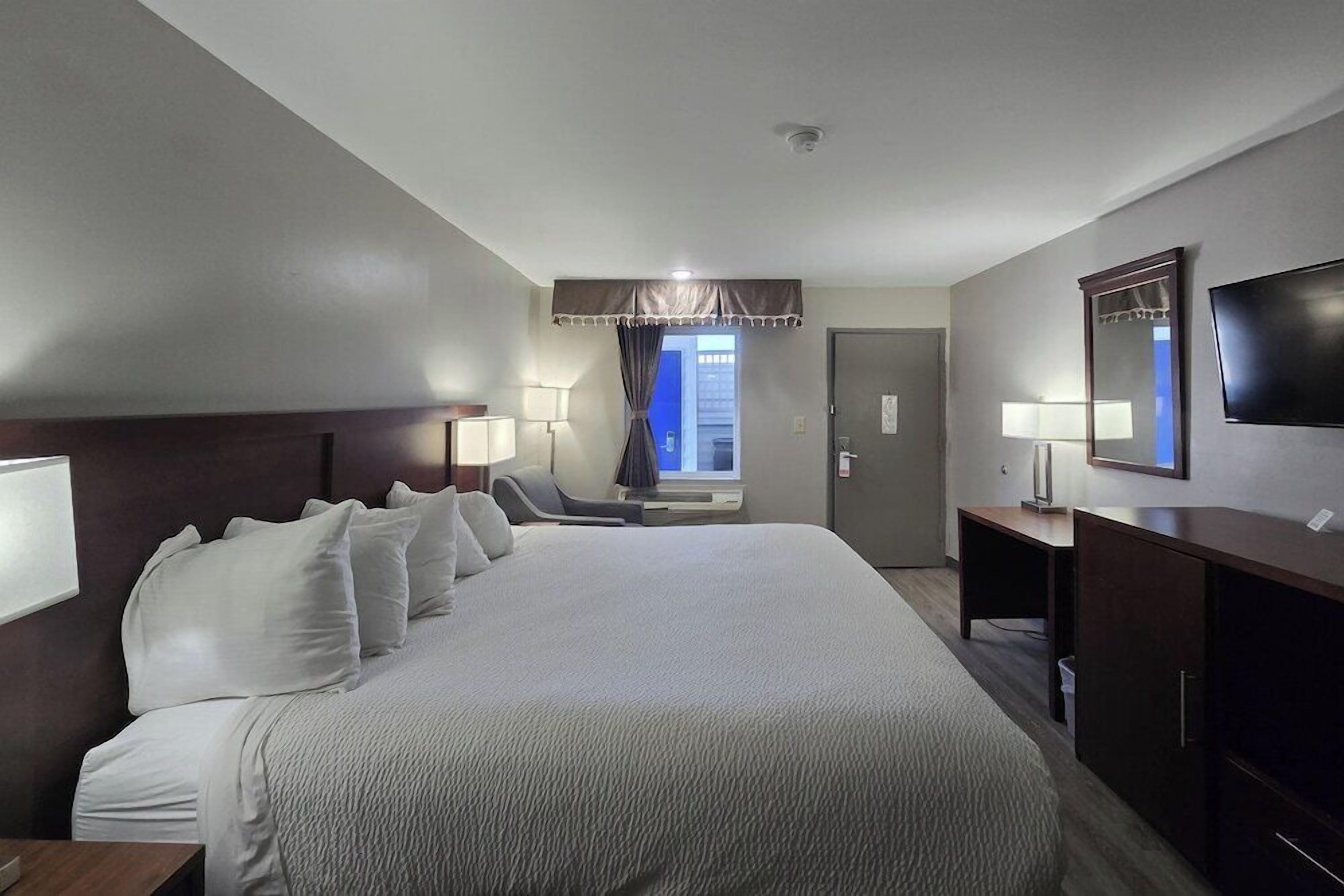 Desk, free WiFi, bed sheets, alarm clocks