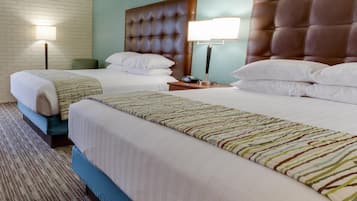 Desk, blackout drapes, iron/ironing board, free cribs/infant beds