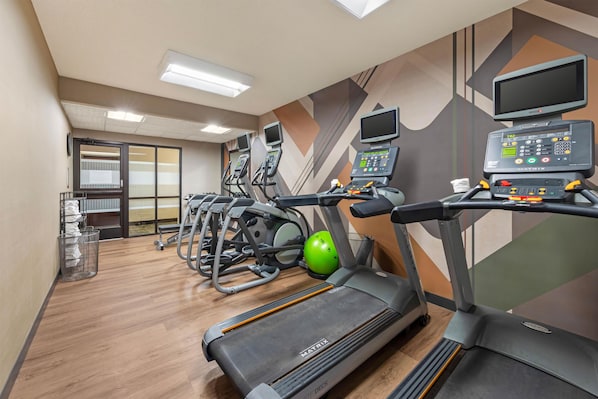 A gym with treadmills, exercise balls, and a rowing machine. - Drury Inn & Suites Birmingham Grandview (Birmingham)