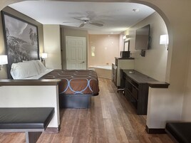 Suite, 1 King Bed, Non Smoking | In-room safe, blackout drapes, iron/ironing board, free WiFi