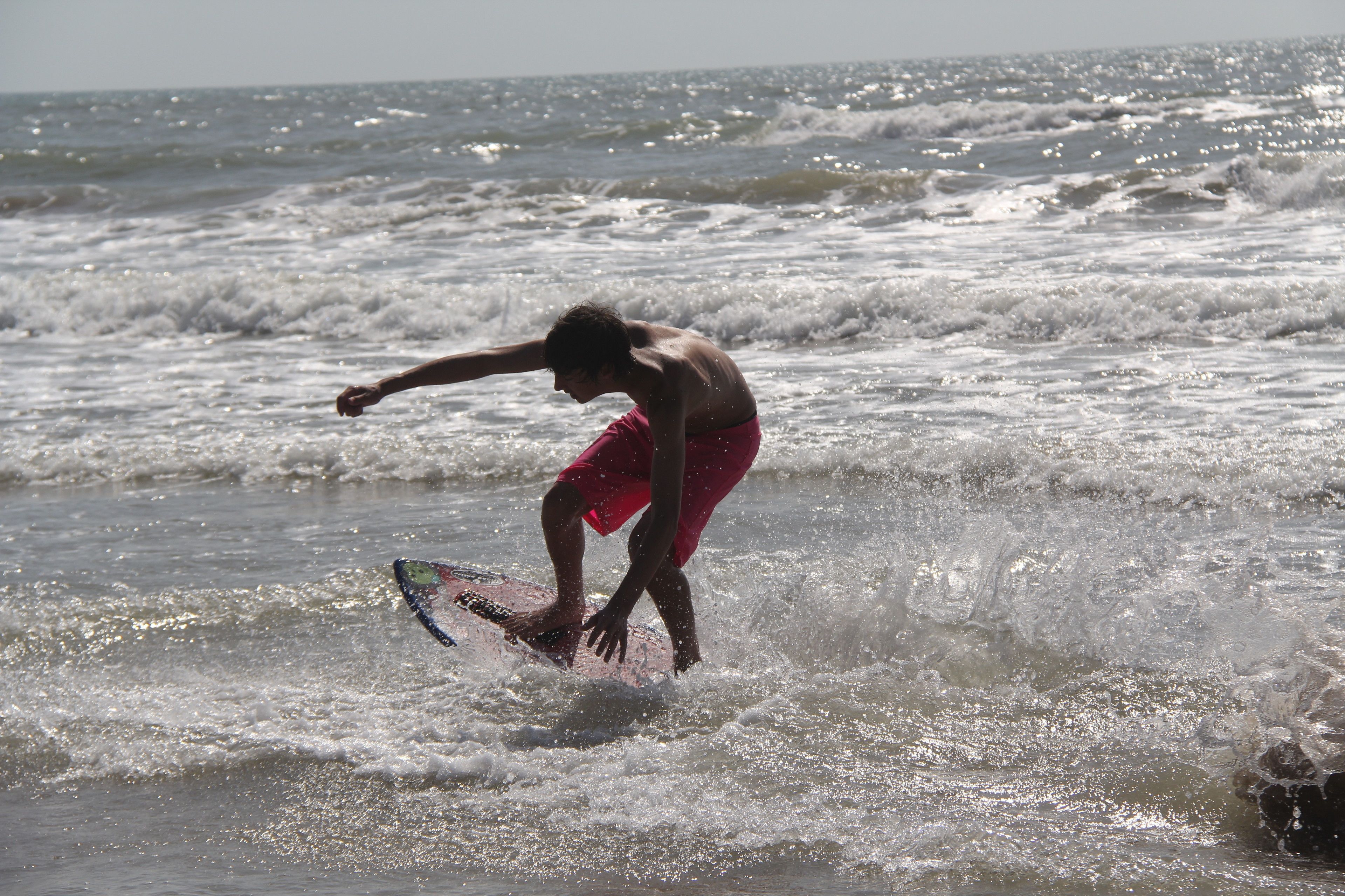 A person surfing on a wave.