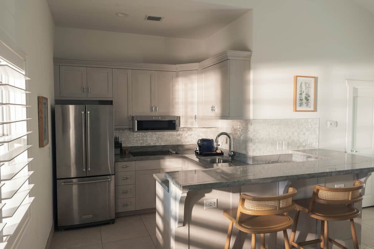 plumeria deluxe suite ocean front 1 king bed | private kitchen | coffee/tea maker