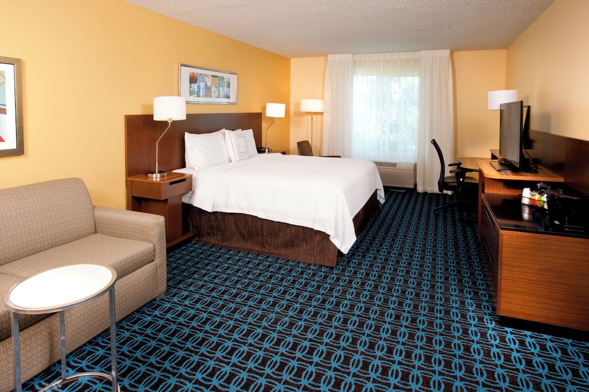 premium bedding, pillow-top beds, desk, laptop workspace