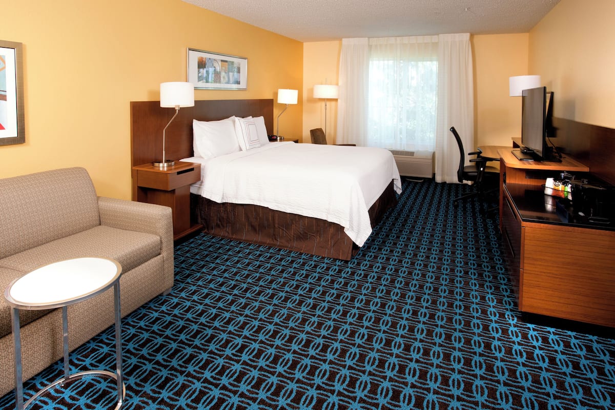 Premium bedding, pillow-top beds, desk, laptop workspace