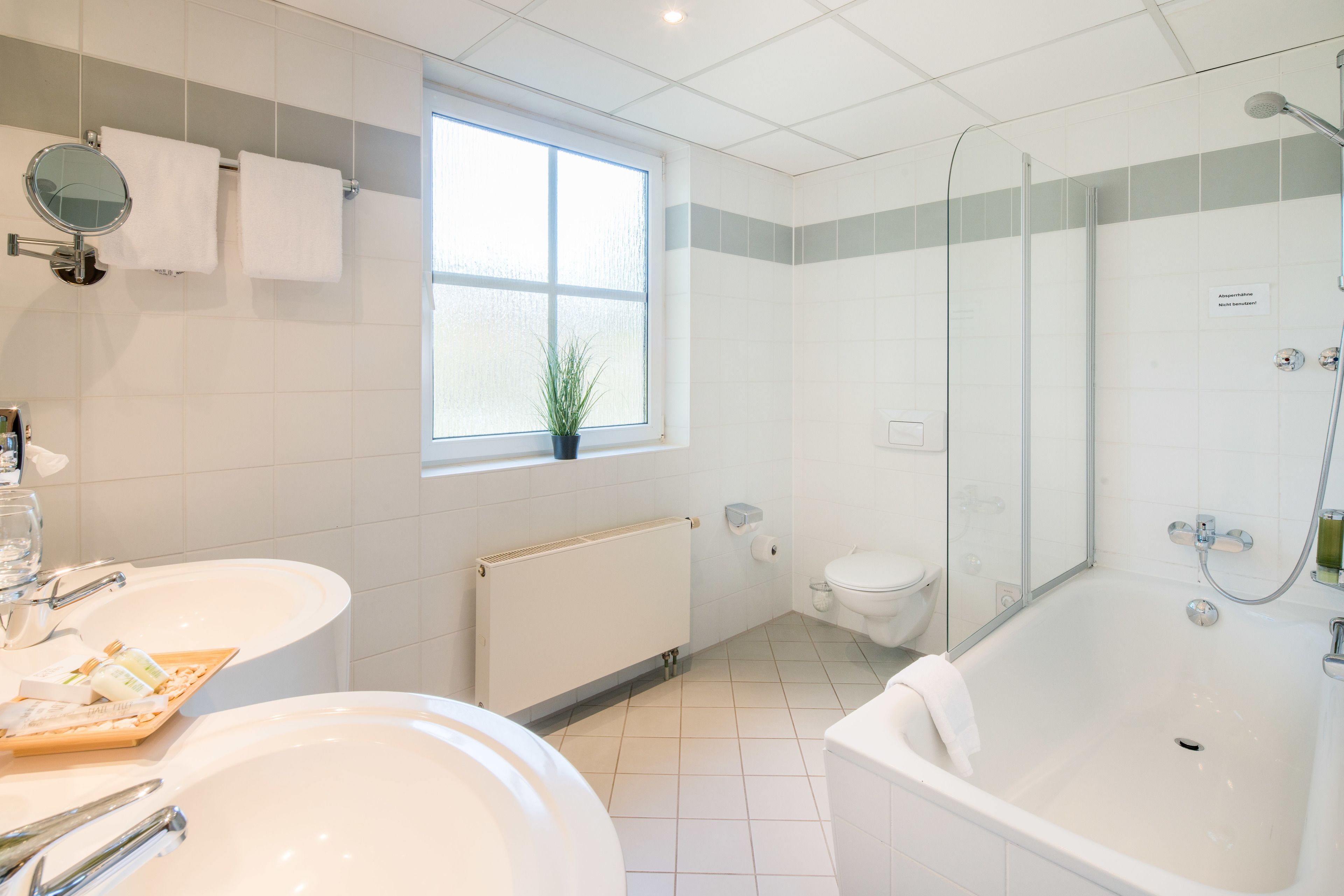 hydromassage showerhead, free toiletries, hair dryer, towels