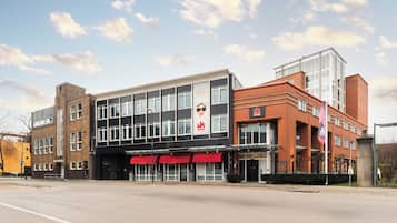 Stylish storefront with a modern design, featuring a prominent logo and large windows.