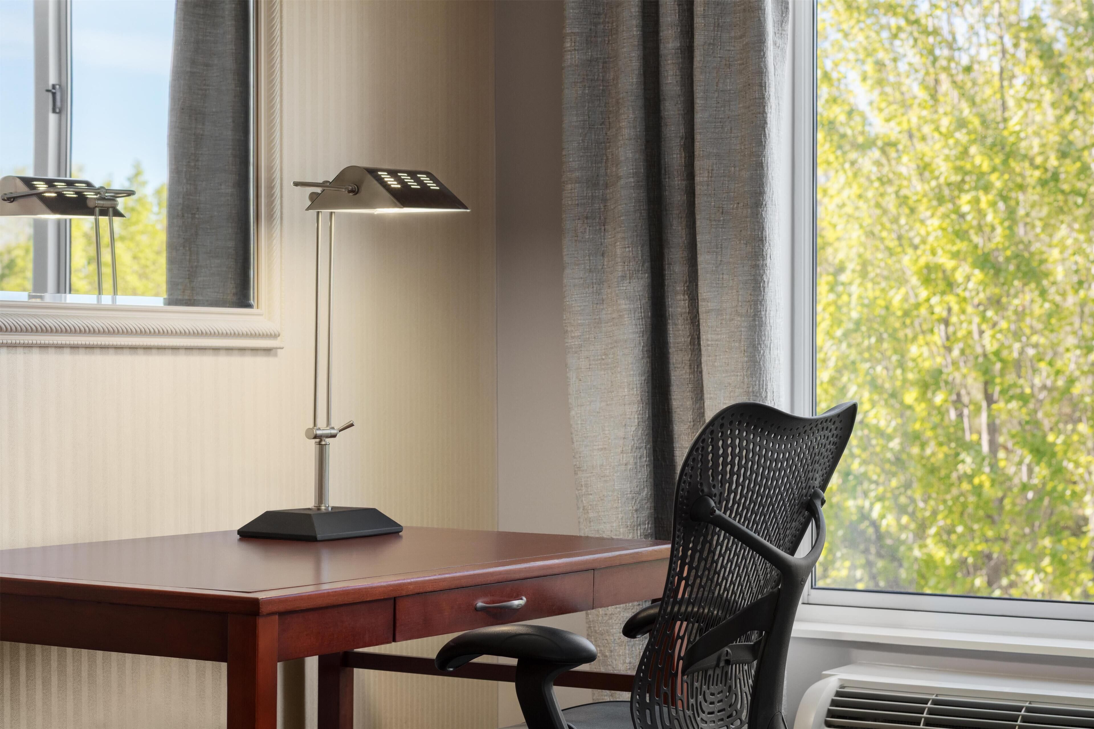 Premium bedding, desk, laptop workspace, iron/ironing board
