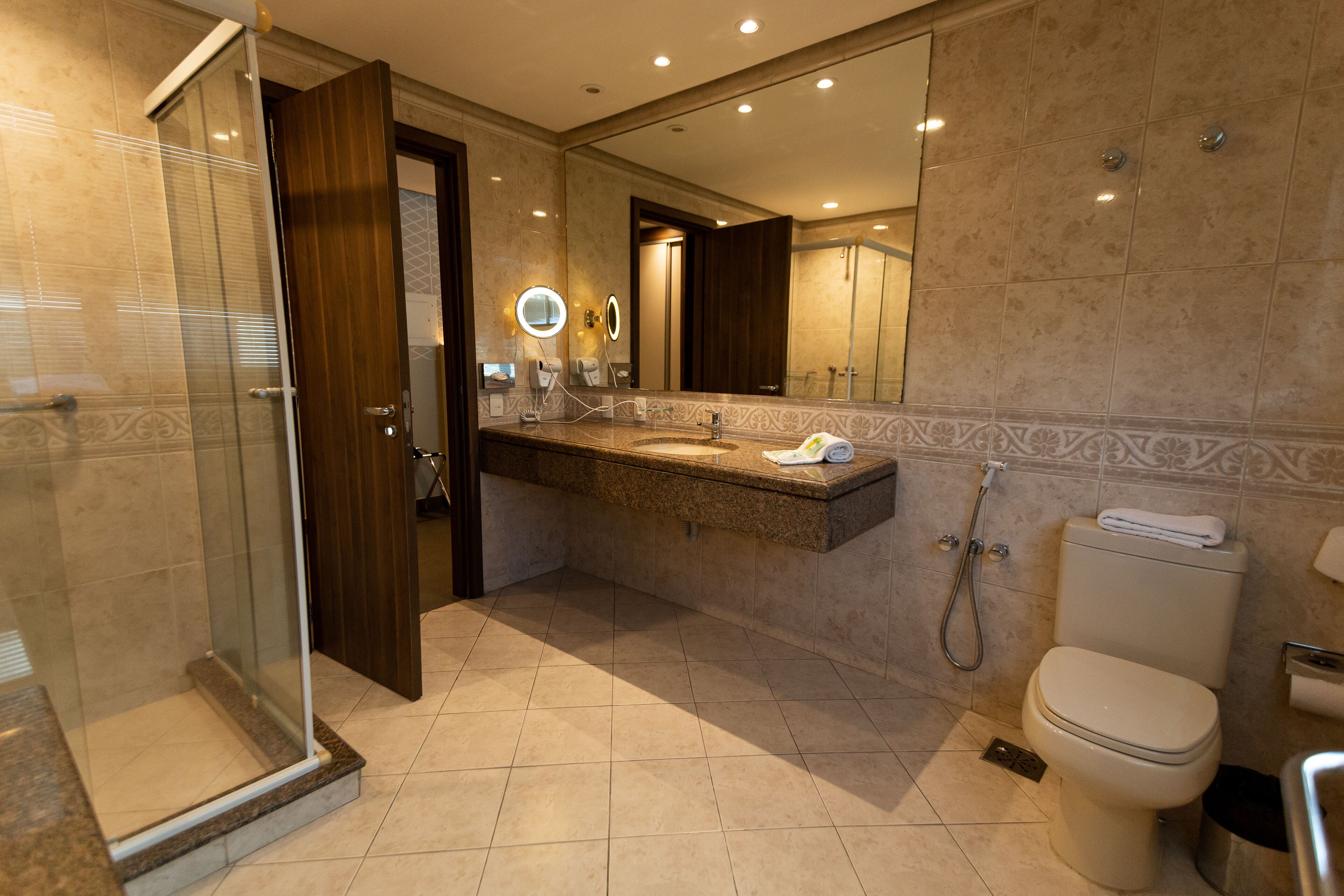 deluxe double room | bathroom | shower, free toiletries, hair dryer, towels