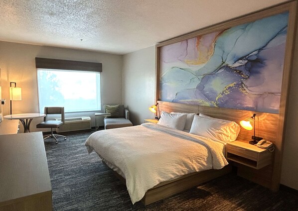 Desk, laptop workspace, iron/ironing board, free cots/infant beds