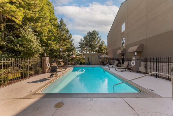 Outdoor pool, open 10:00 AM to 9:00 PM, pool umbrellas, pool loungers