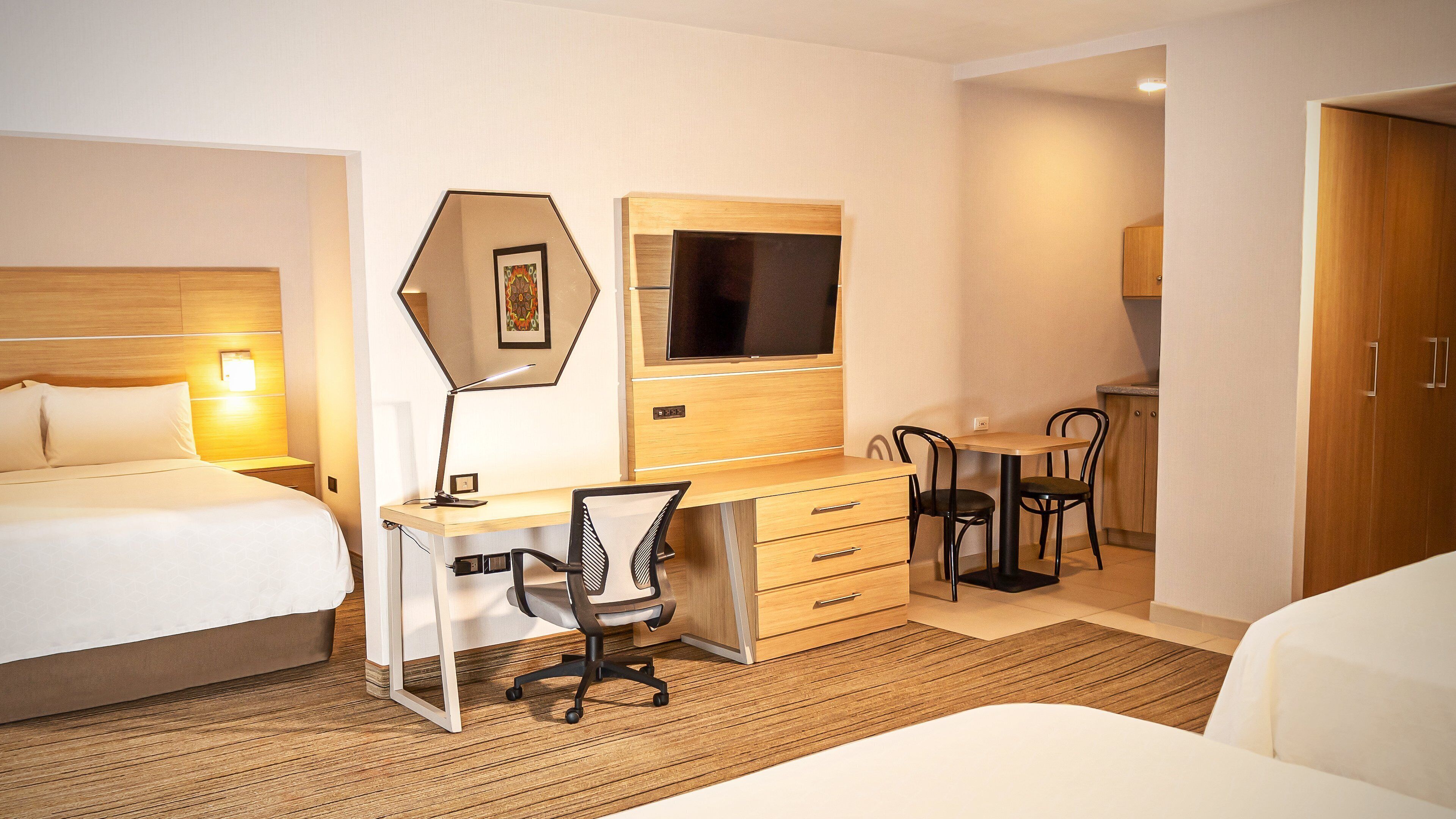 suite, multiple beds | 1 bedroom, in-room safe, desk, iron/ironing board