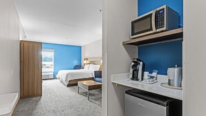 A hotel room with a bed, a desk, a microwave, a coffee maker, and a dishwasher. - Holiday Inn Express Hotel & Suites Carneys Point by IHG (Penns Grove)