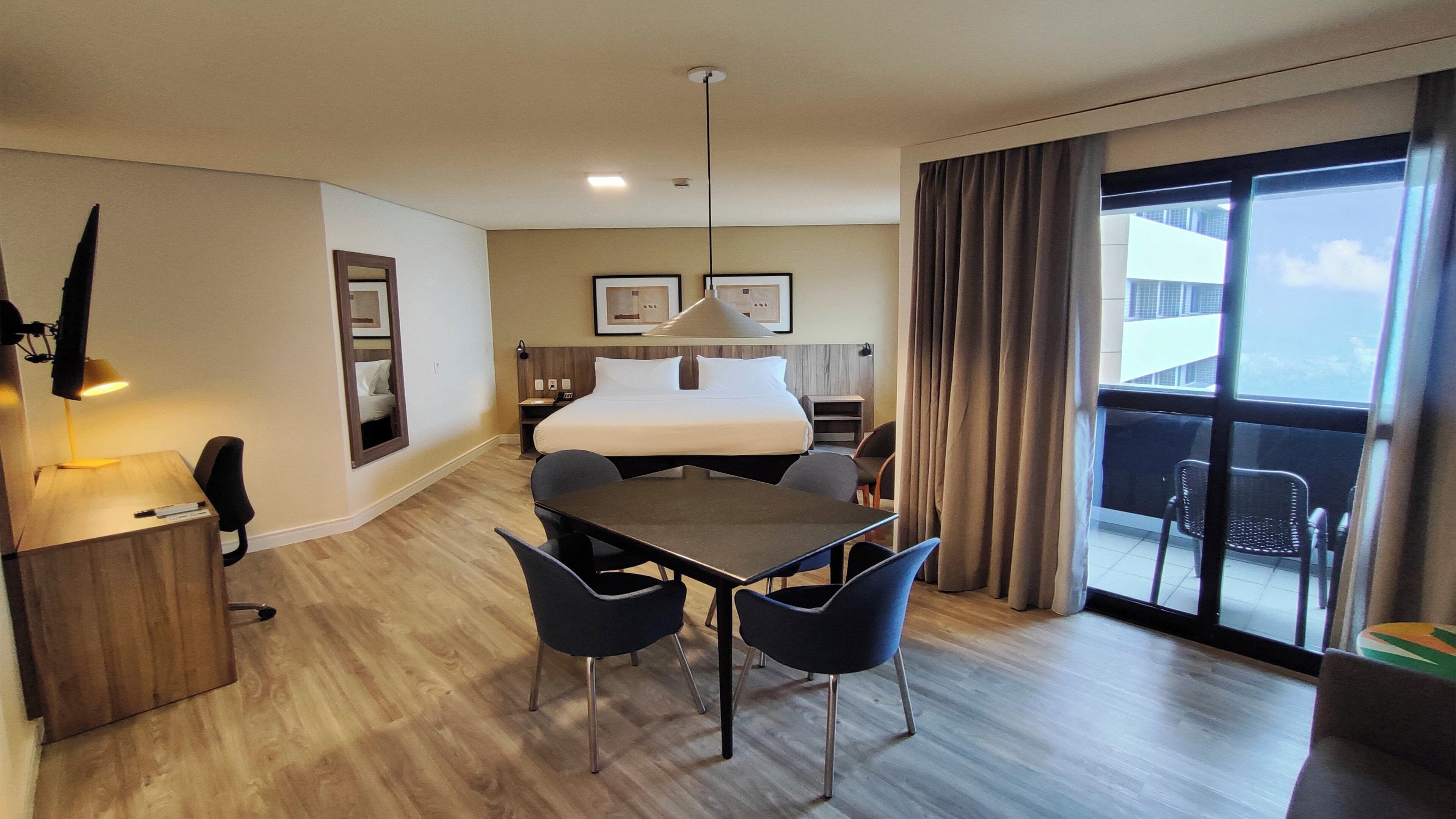 Premium Room, 1 King Bed, Balcony | Minibar, in-room safe, desk, iron/ironing board