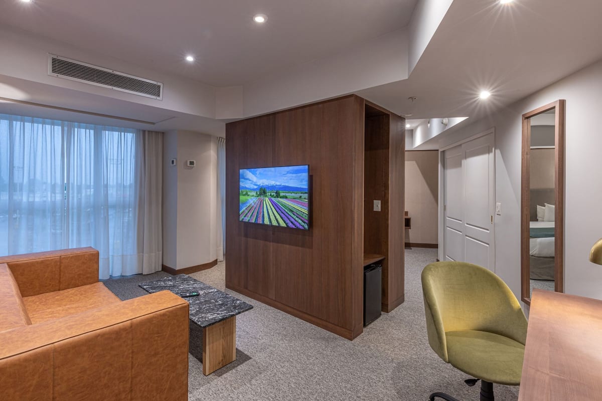 Suite, 1 King Bed (View) | Minibar, in-room safe, desk, soundproofing