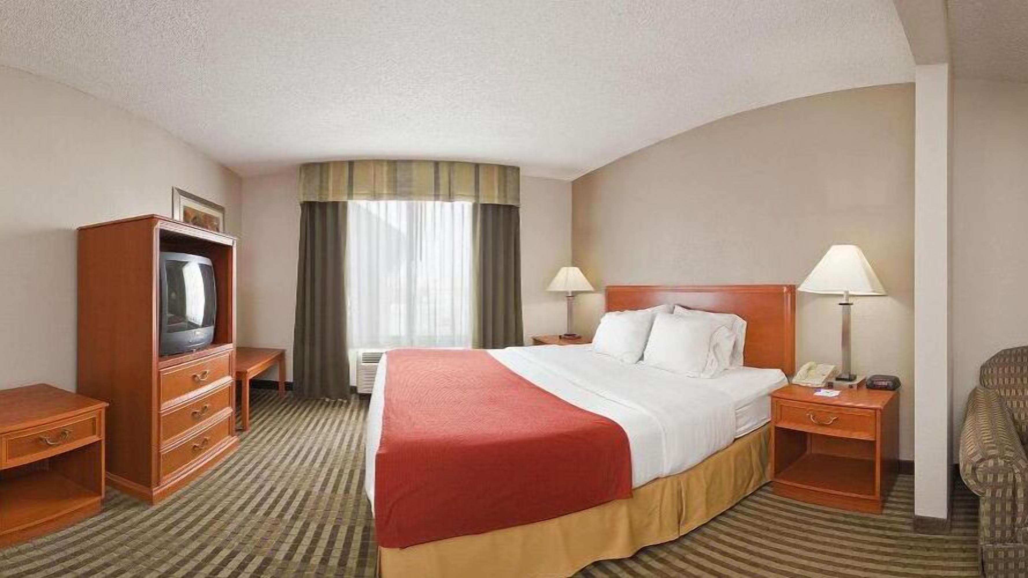 In-room safe, desk, iron/ironing board, free cribs/infant beds