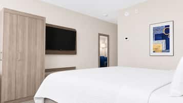 Suíte, 1 cama King e sofá-cama | Escrivaninha, ferros/tábuas de passar roupa, Wi-Fi de cortesia