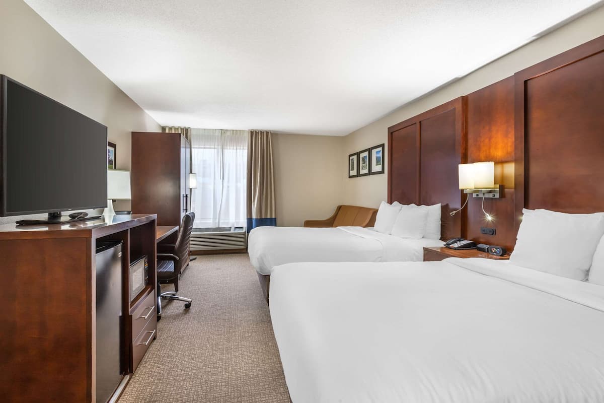 Suite, Multiple Beds, Non Smoking | Blackout drapes, iron/ironing board, free cribs/infant beds