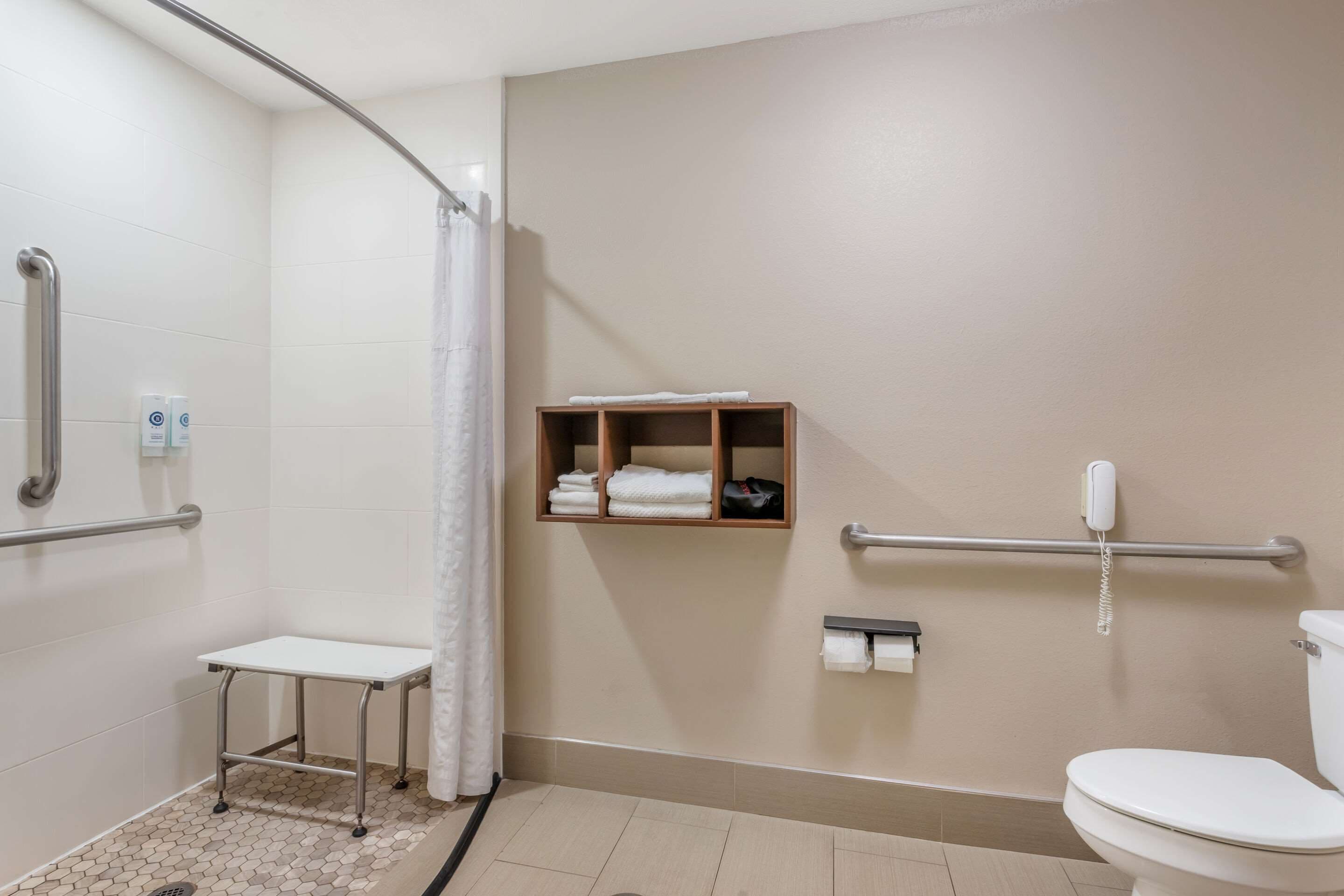 room, 1 king bed, accessible, non smoking | blackout curtains, iron/ironing board, free cots/infant beds