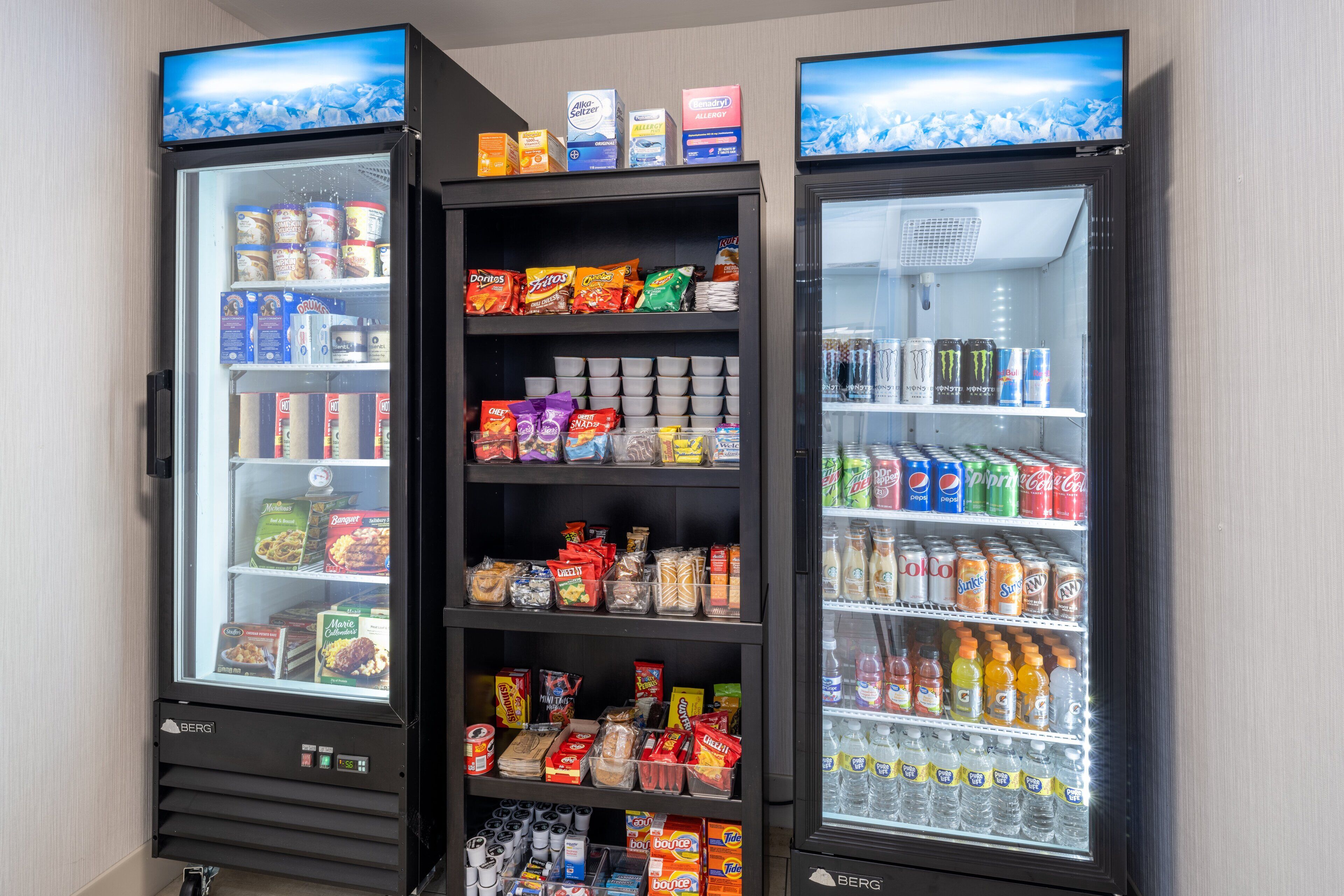 A vending machine stocked with snacks, beverages, and other food items.