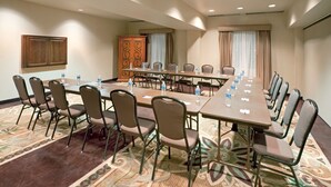 A conference room with a long table, chairs, and water bottles. - Holiday Inn Express & Suites Eagle Pass by IHG (Eagle Pass)
