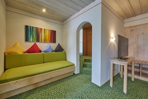 Double Room (Flair Plus) | Living area | Flat-screen TV
