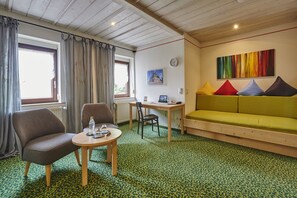 Double Room (Flair Plus) | Living area | Flat-screen TV