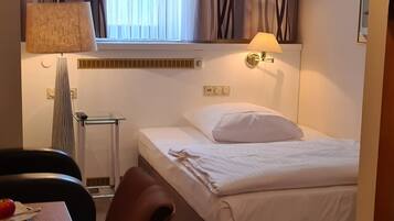 Hypo-allergenic bedding available, in-room safe, desk, laptop workspace