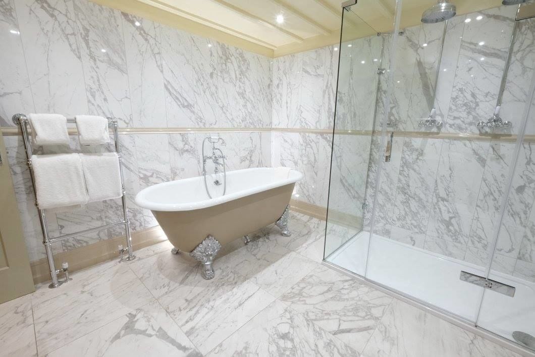 junior suite | bathroom | combined shower/bathtub, hair dryer, bathrobes, bidet