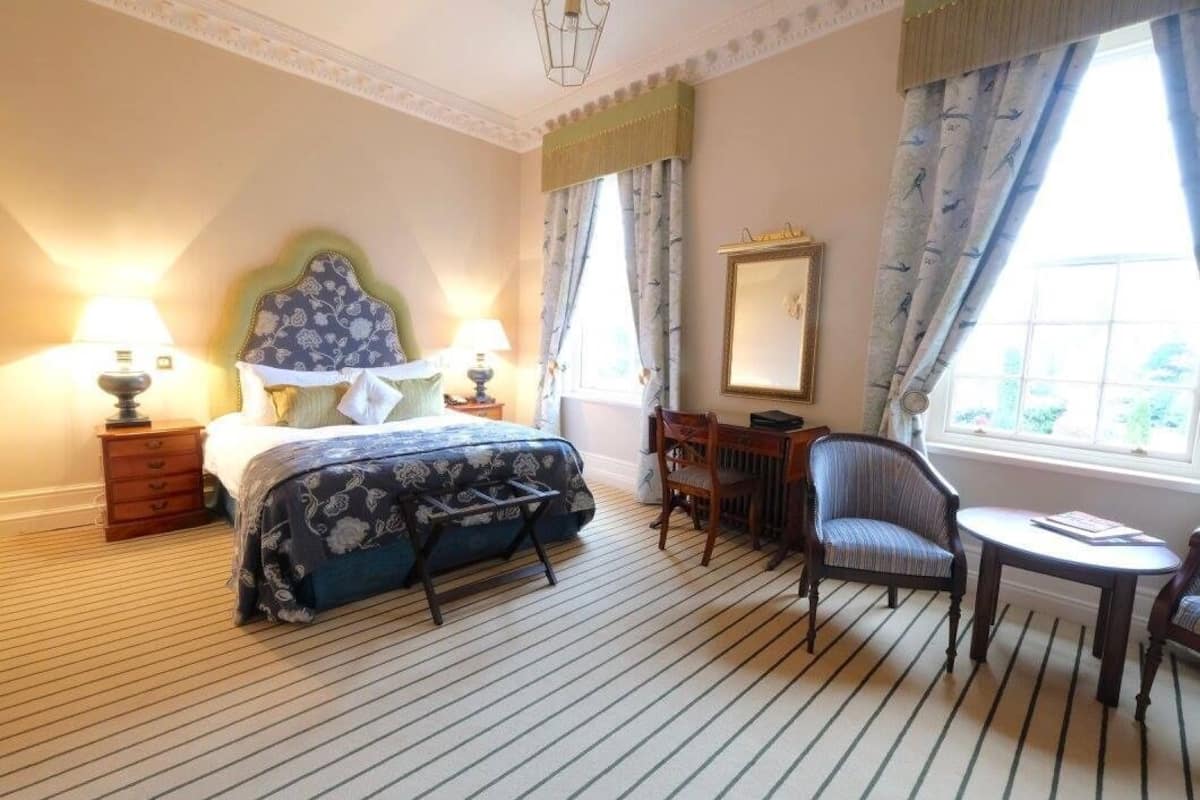 Deluxe Double Room | In-room safe, iron/ironing board, cribs/infant beds, rollaway beds