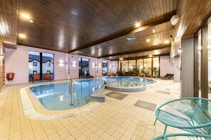 Indoor pool, open 7:30 AM to 8:30 PM, pool loungers