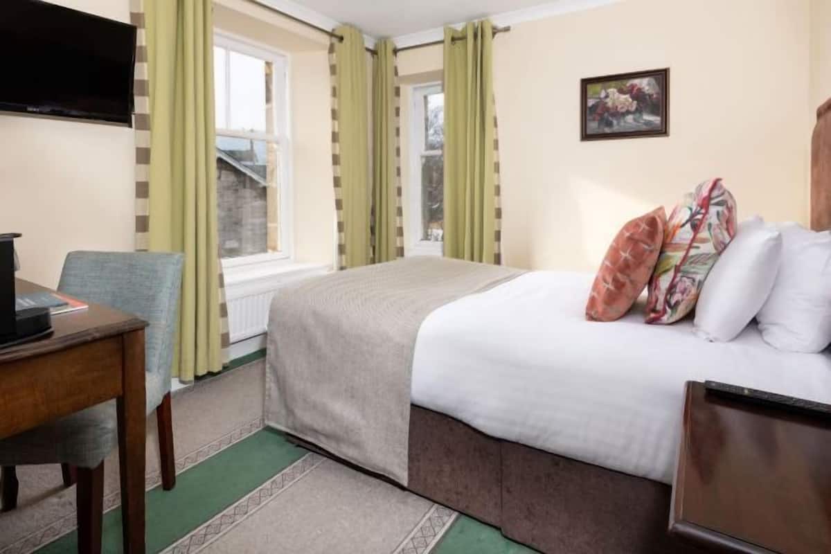 Desk, blackout drapes, iron/ironing board, free WiFi