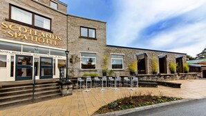 The exterior of the Scotlands Spa Hotel with a reception area, swimming pool, and spa services.