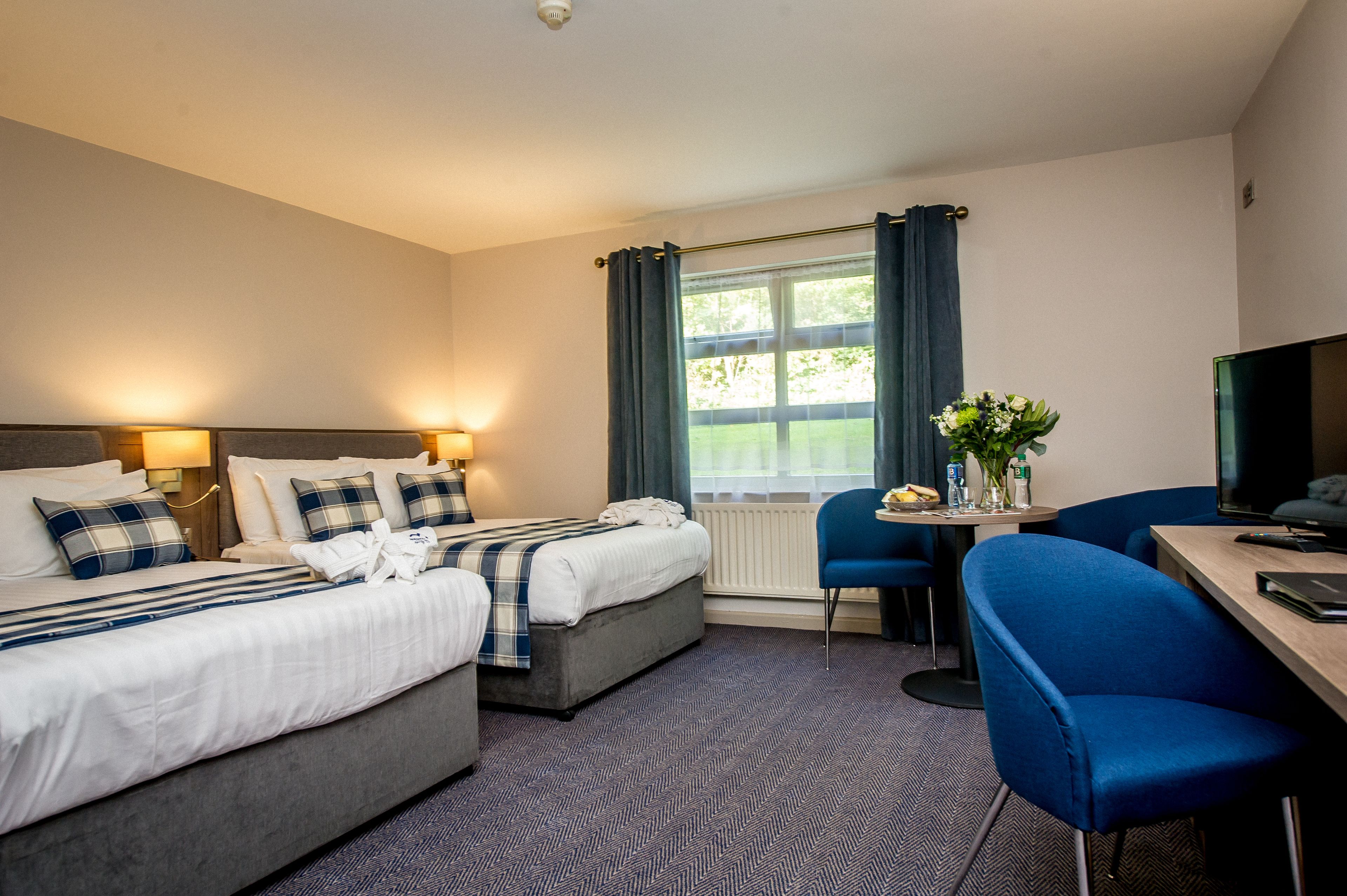 family room | premium bedding, in-room safe, desk, iron/ironing board