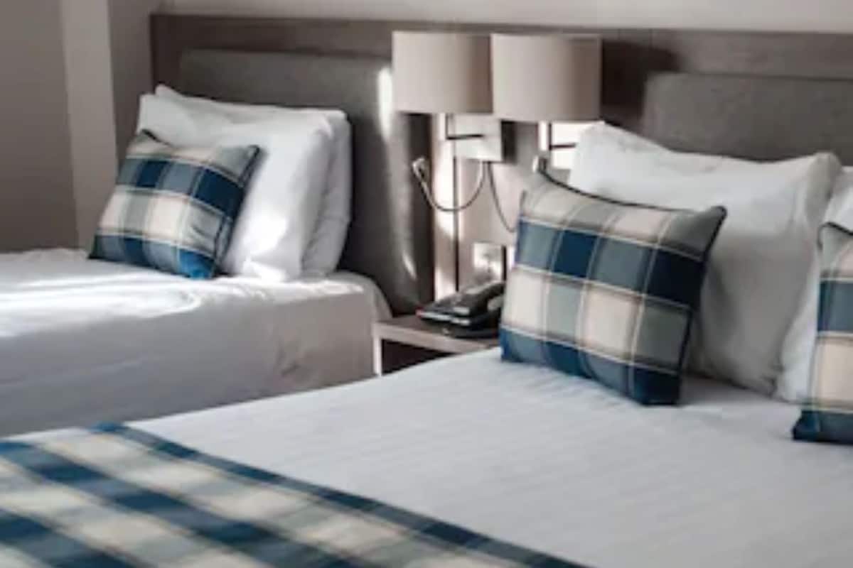 family room | premium bedding, in-room safe, desk, iron/ironing board