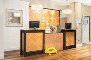 Check-in/check-out kiosk