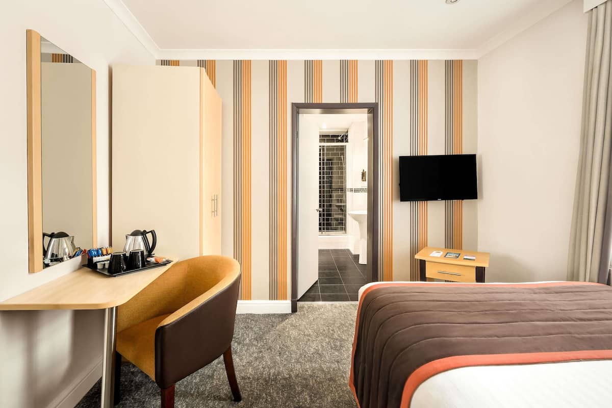 Hypo-allergenic bedding, pillow-top beds, desk, laptop workspace