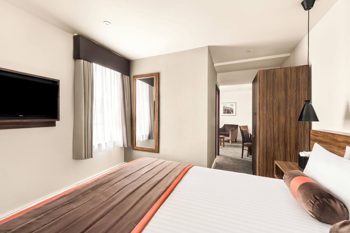 Hypo-allergenic bedding, pillowtop beds, desk, laptop workspace