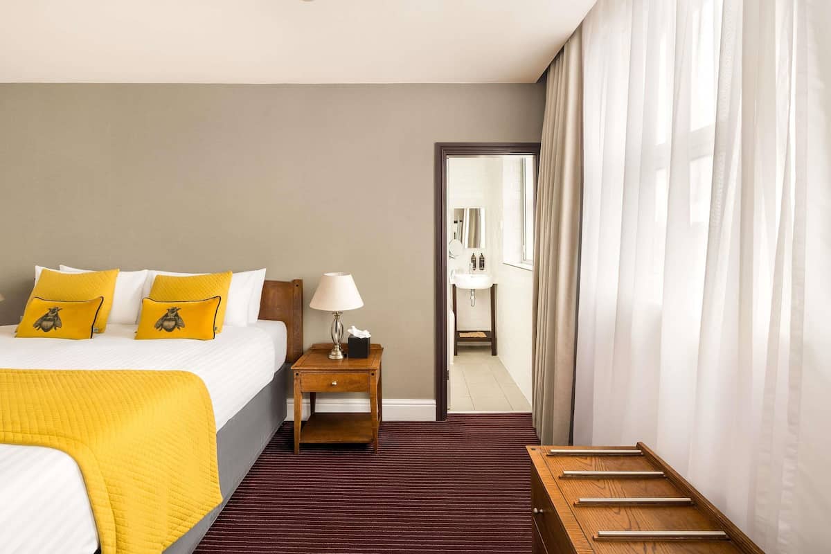 Hypo-allergenic bedding, pillow-top beds, desk, laptop workspace
