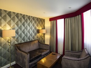 Hypo-allergenic bedding, pillowtop beds, desk, laptop workspace