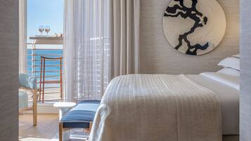 Ropa de cama de alta calidad, minibar, caja fuerte y escritorio