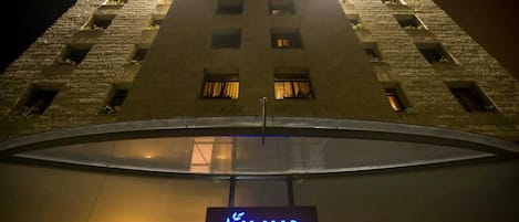 A building with a sign reading "CAESAR PREMIER" at the entrance.