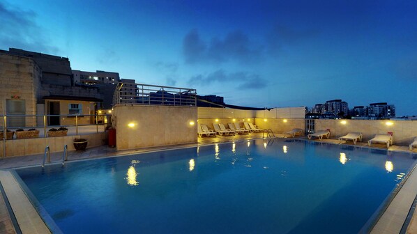 Seasonal outdoor pool, pool umbrellas, sun loungers