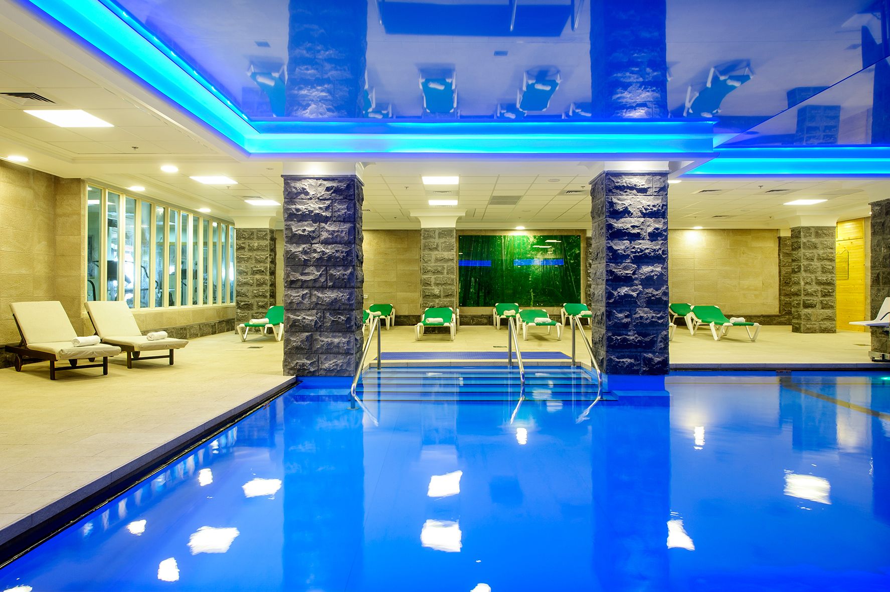 indoor pool, seasonal outdoor pool, pool loungers