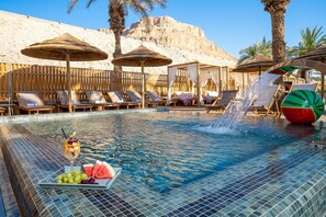 Indoor pool, outdoor pool, pool umbrellas, sun loungers